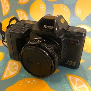 Ricoh XR-X or XR-M in other markets - comes with 3 lenses